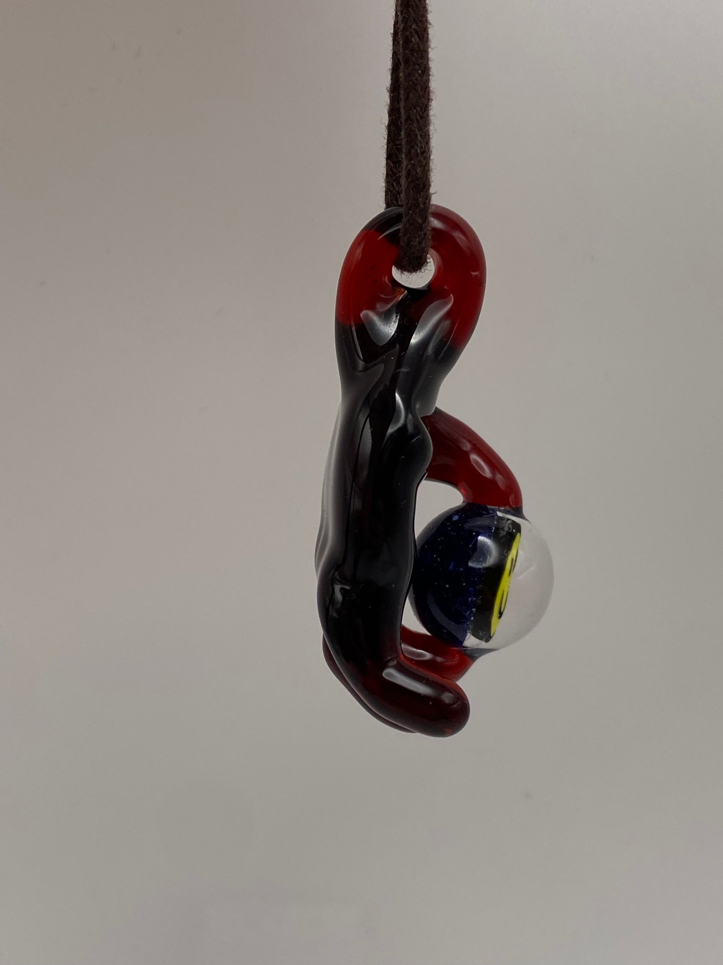 Holding onto a Smile Pendant - Pomegranate