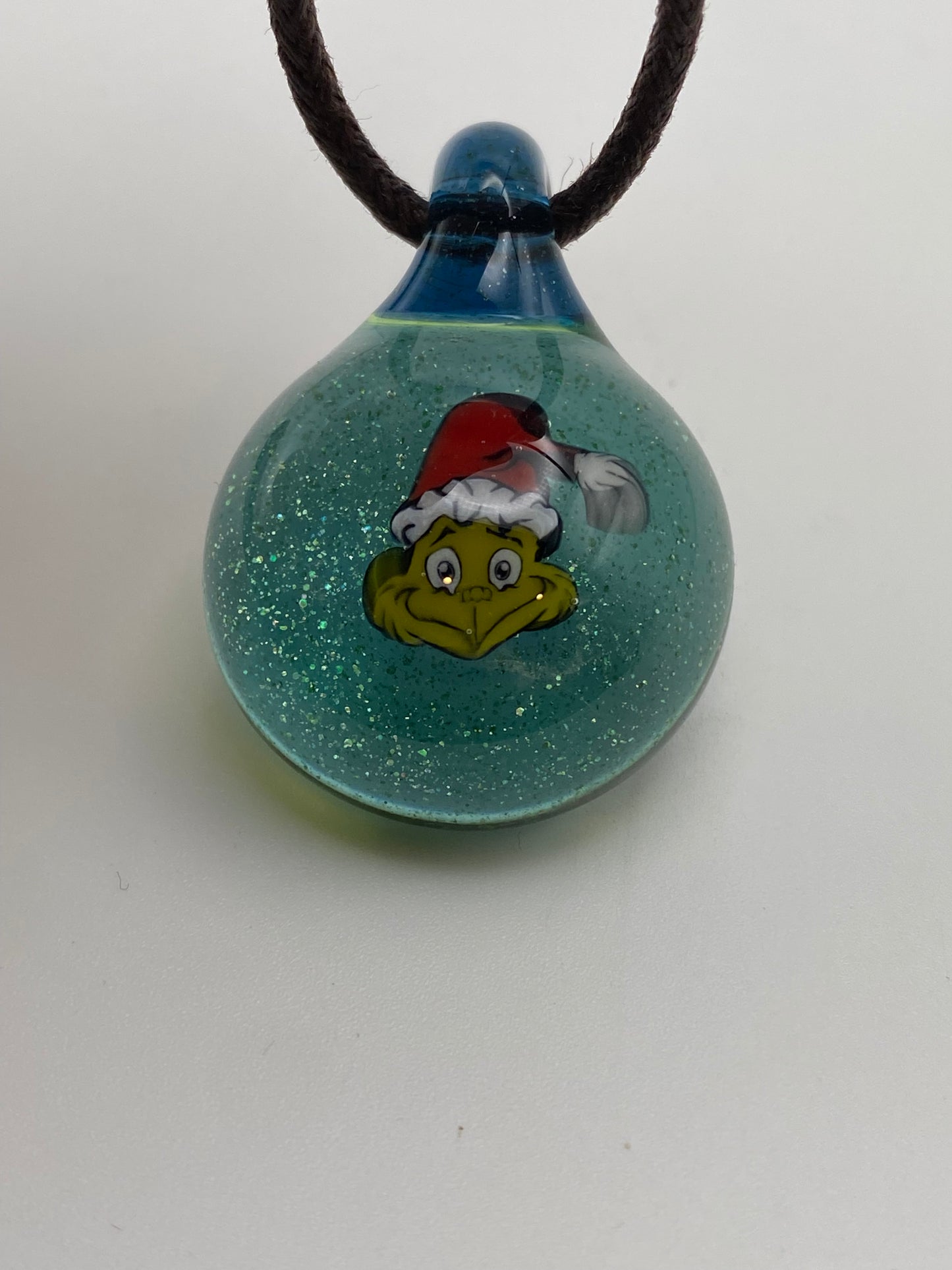 Grinch Santa UV Pendant - Blue Stardust