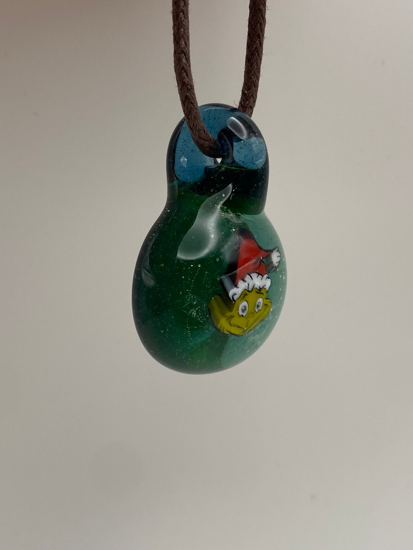 Grinch Santa UV Pendant - Blue Stardust