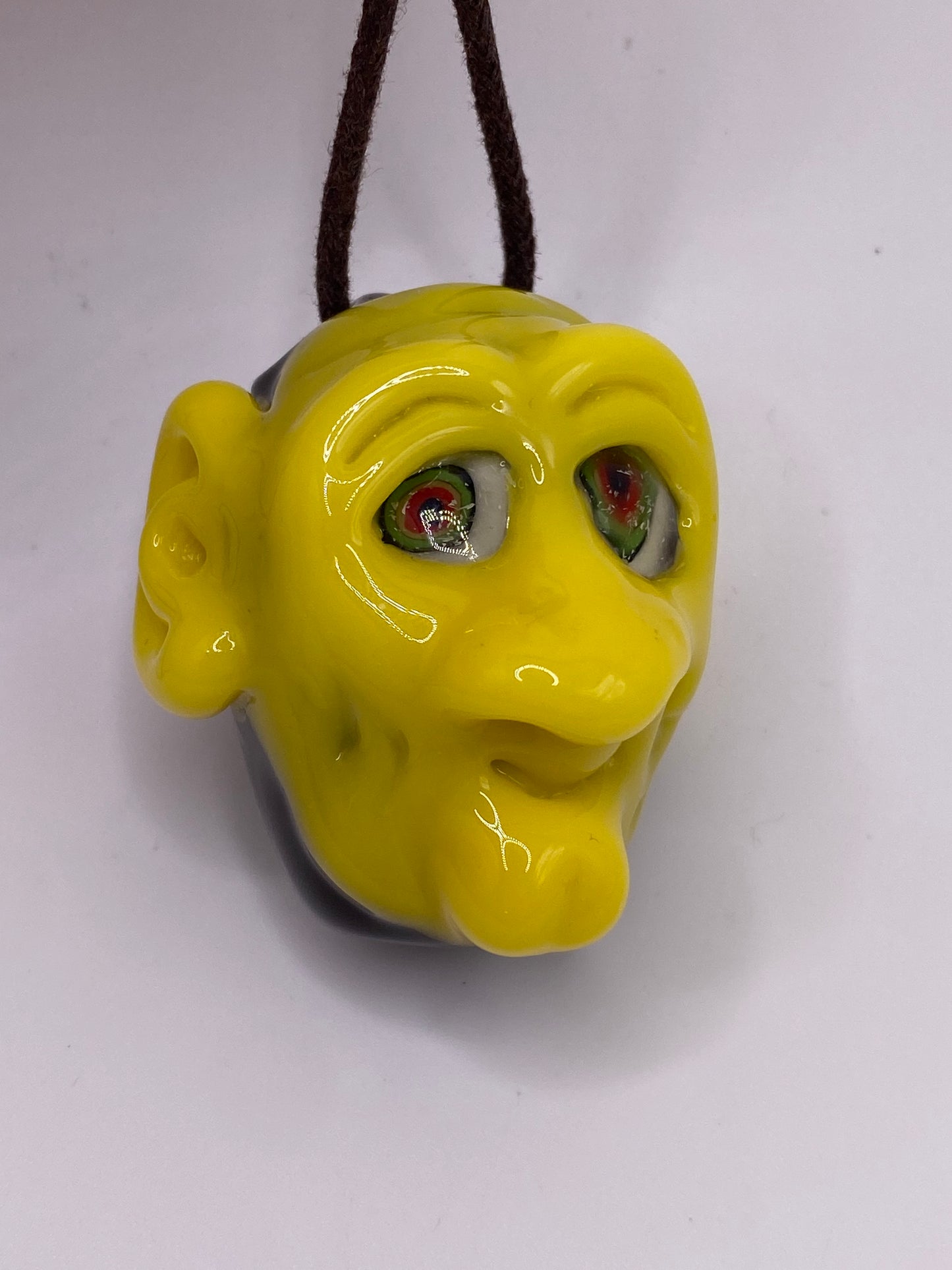 Sculpted Face Pendant - Canary and Grizzly with Rasta Eyes